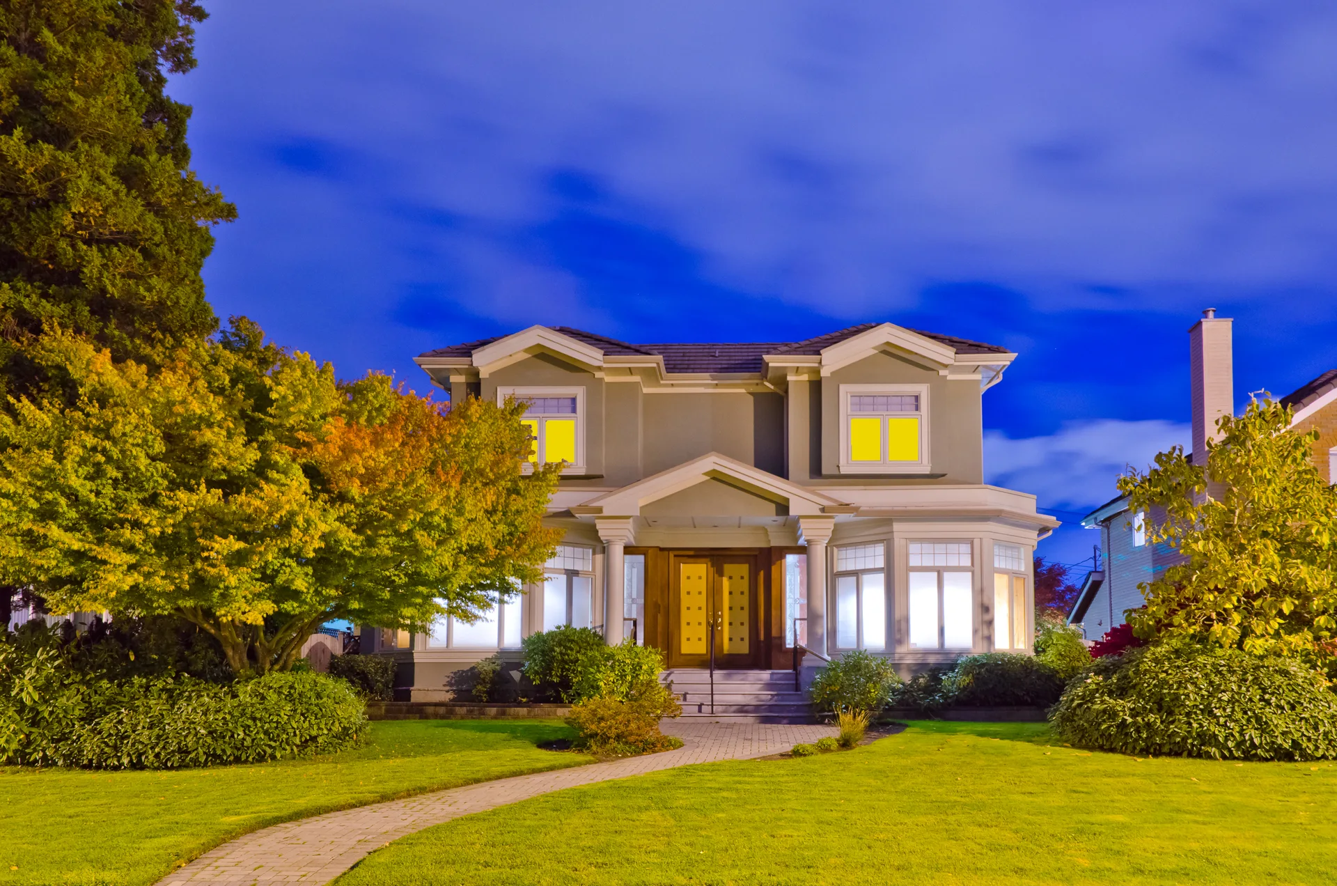 House exterior glowing at dusk