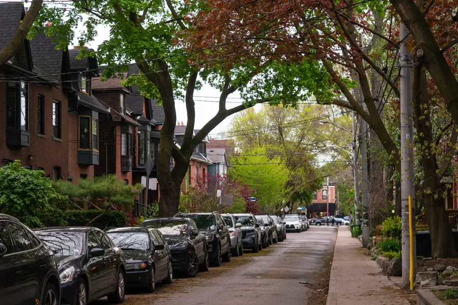 Tree-lined residential street in a Toronto neighbourhood